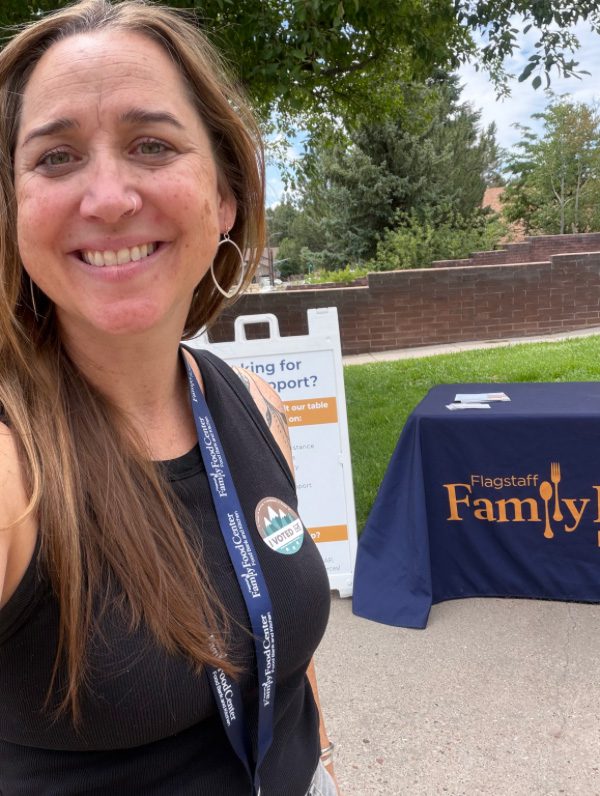 Lindsey-Resources Lindsey Hebegger smiling aside resource table for FFFC